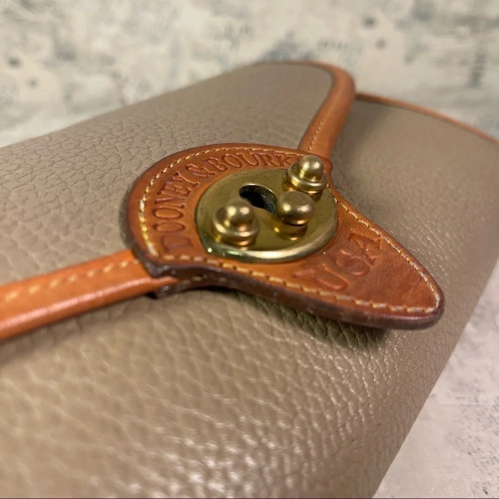 Vintage Dooney & Bourke All Weather Leather Cavalry Pochette R77